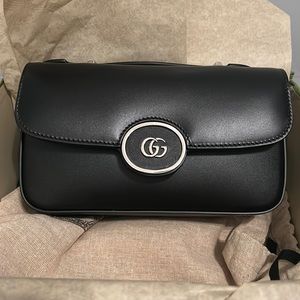 Classic Gucci petite mini bag. Brand new. Original packaging and receipt.